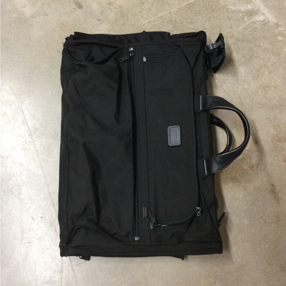 Tumi Black Men's Travel Duffel with Front Zip Pocket and Carry Handles